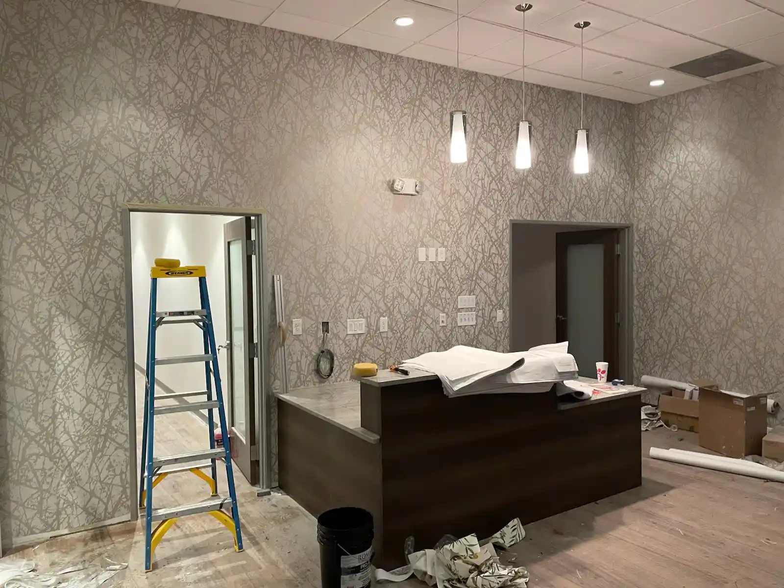 Professional wallpaper installer at work in Orlando FL